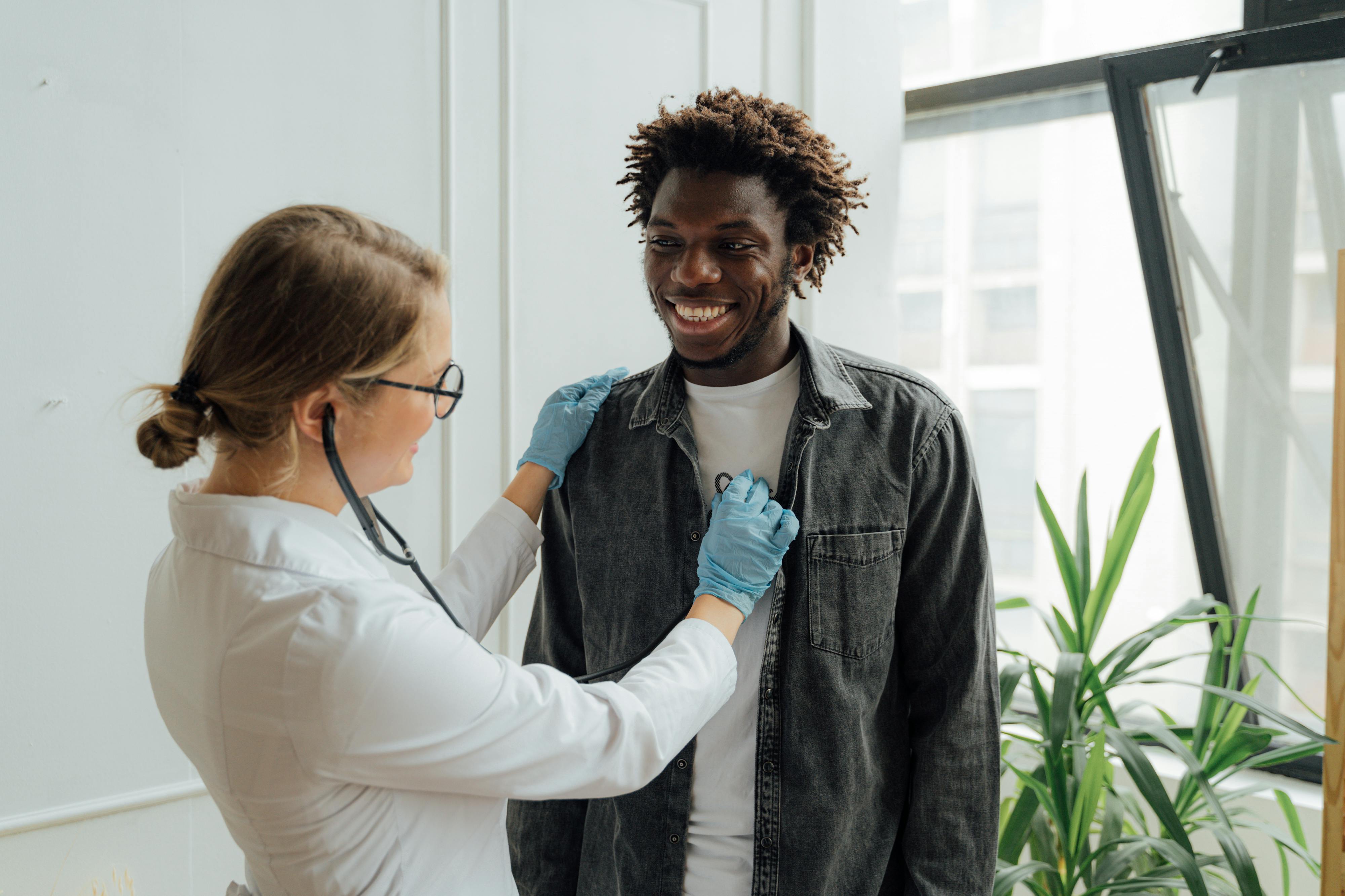 Healthcare professional consulting with patient in modern clinic